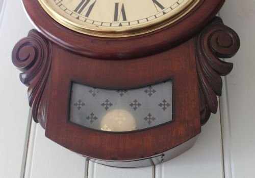 fig 1. mahogany drop dial wall clock