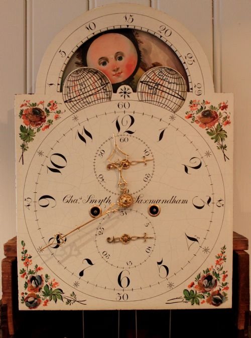 fig 1. Mahogany moon roller longcase clock