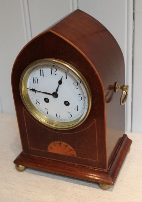 fig 1. mahogany and inlay striking mantel clock
