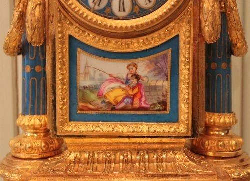 fig 1. French gilt metal and porcelain mantel clock