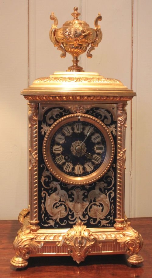 French Gilt Brass and Decorative Panel Mantel Clock