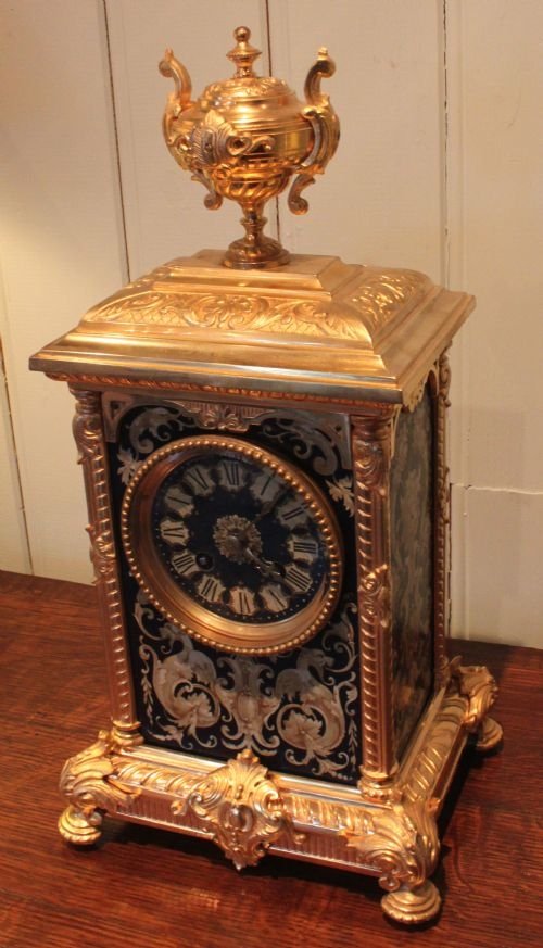 fig 1. French gilt brass and decorative panel mantel clock