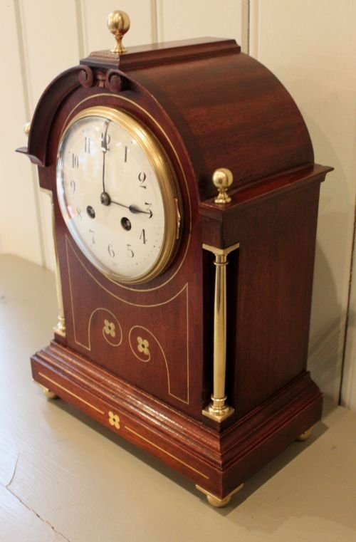 fig 1. mahogany and brass inlaid mantel clock