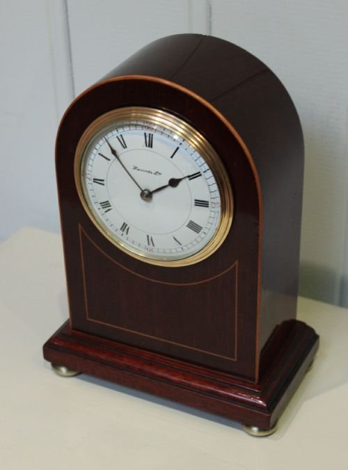 fig 1. mahogany arch top mantel clock retailed by Harrods