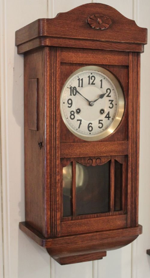 fig 1. small oak three glass wall clock