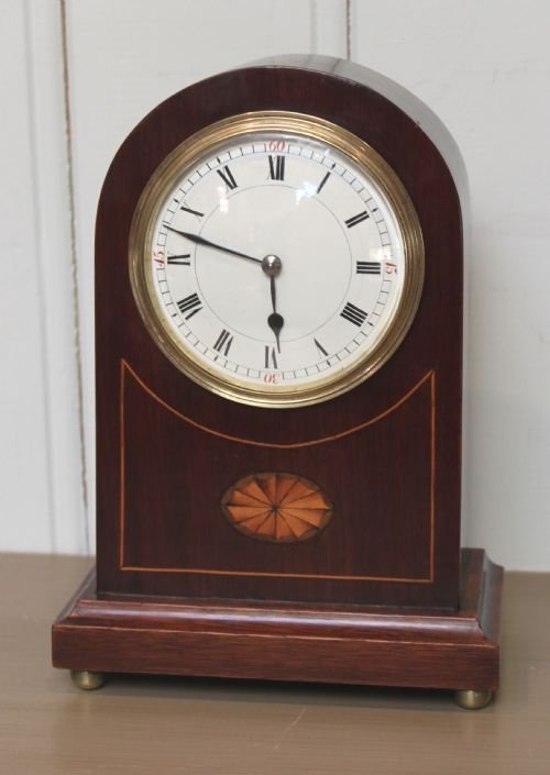 fig 1. mahogany and inlaid arch top mantel clock