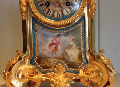 fig 1. Ormolu and porcelain panel mantel clock