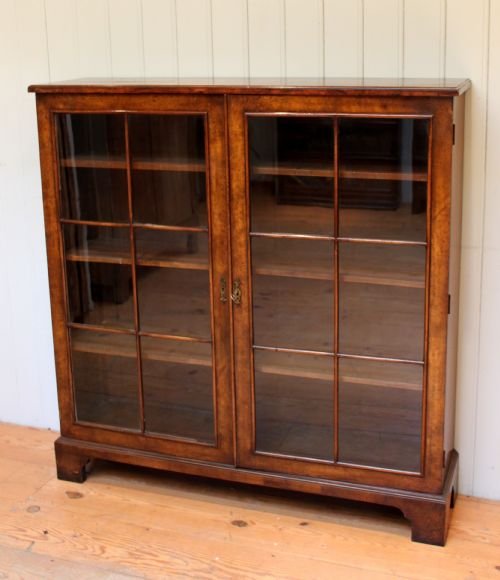 Burr Walnut Two Door Glazed Bookcase