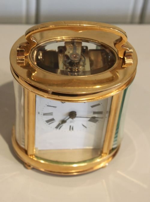 fig 1. Oval Timepiece Carriage Clock With Case
