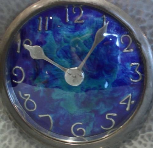 fig 1. Pewter Arts and Crafts Mantel Clock