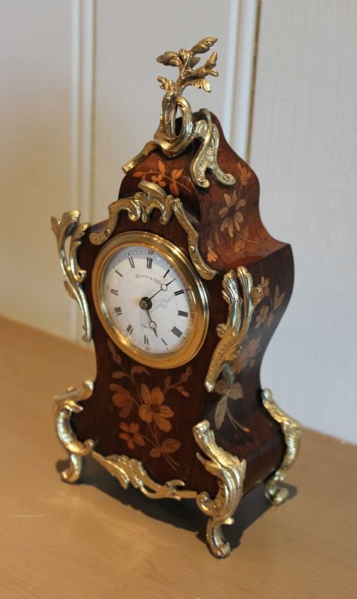fig 1. Small Rosewood and Inlaid Mantel Clock