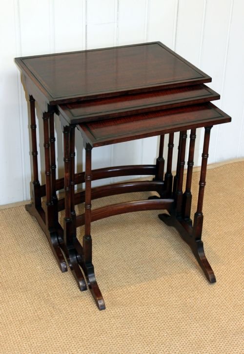 Nest of Three Mahogany Tables
