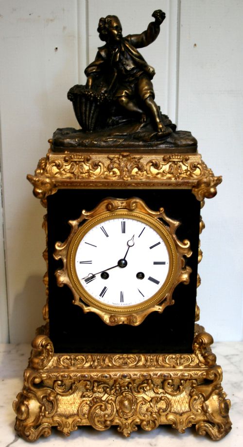 French Ebonised, Bronze and Gilt Mantel Clock
