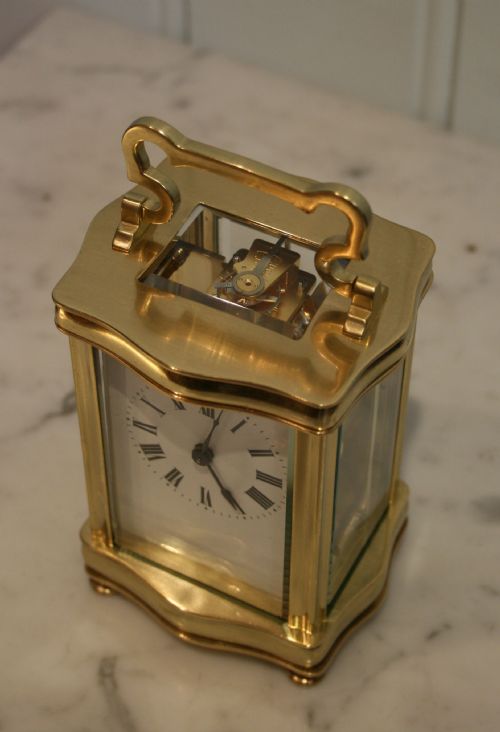 fig 1. Serpentine Case Timepiece Carriage Clock