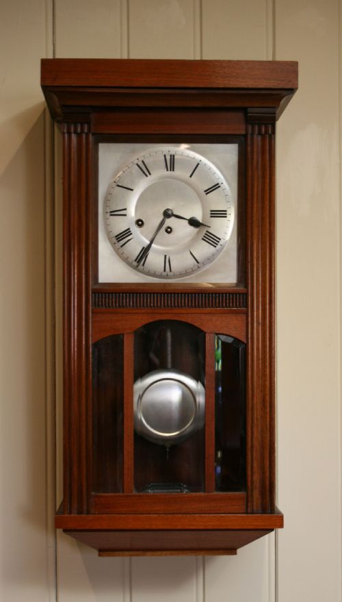 fig 1. Walnut Westminster Chime Three-Glass Wall Clock