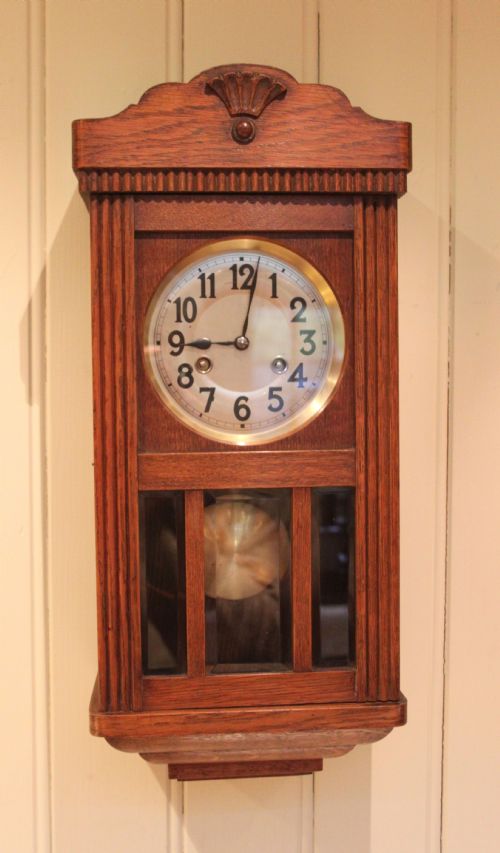 Small Oak Striking Wall Clock