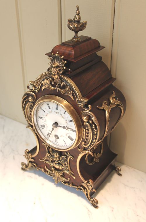 fig 1. Walnut and Brass Waisted Mantel Clock