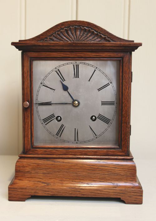 Striking Oak Mantel Clock