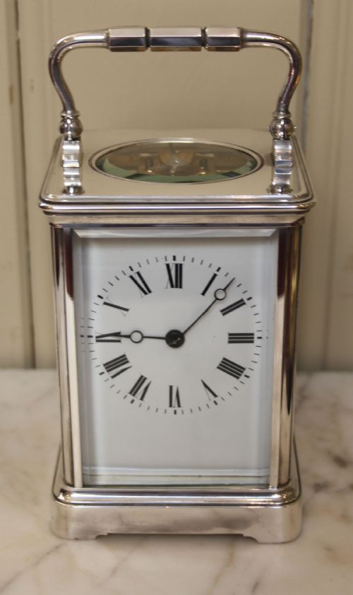 Striking Silver Plated Carriage Clock by Margaine