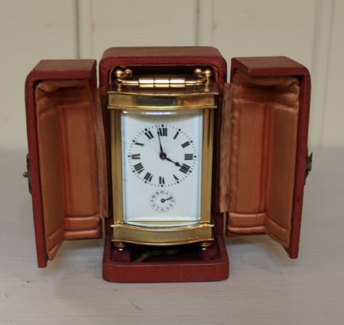 Serpentine Alarm Carriage Clock in a Winged Travel Case