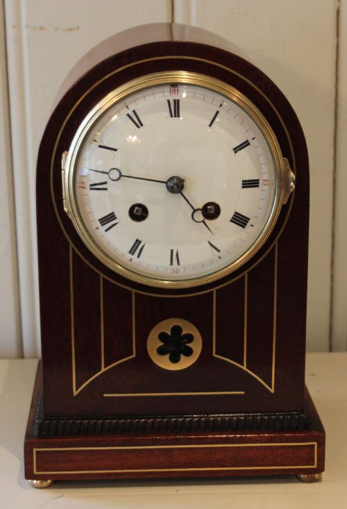 fig 1. Mahogany Arch Top and Brass Inlay Mantel Clock