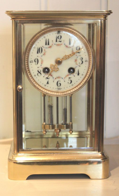 fig 1. Bell Striking Four Glass Mantel Clock