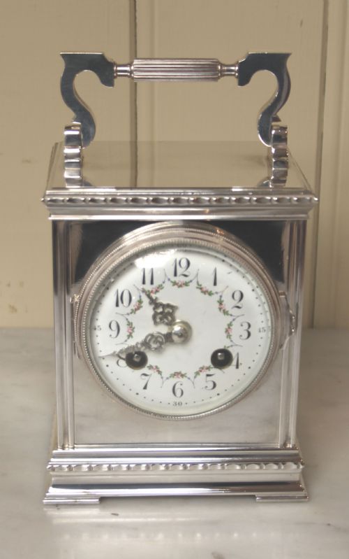 Striking Silver Plated Carriage Clock