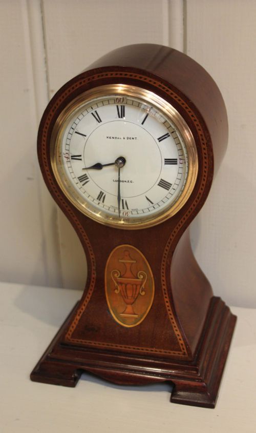 Edwardian Mahogany Waisted Balloon Clock