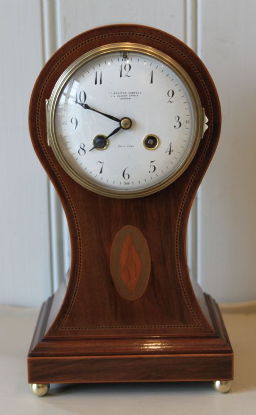 fig 1. Edwardian Mahogany and Inlay Balloon Clock