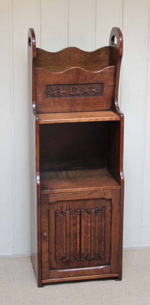 Oak Cabinet Having a Magazine Rack Top