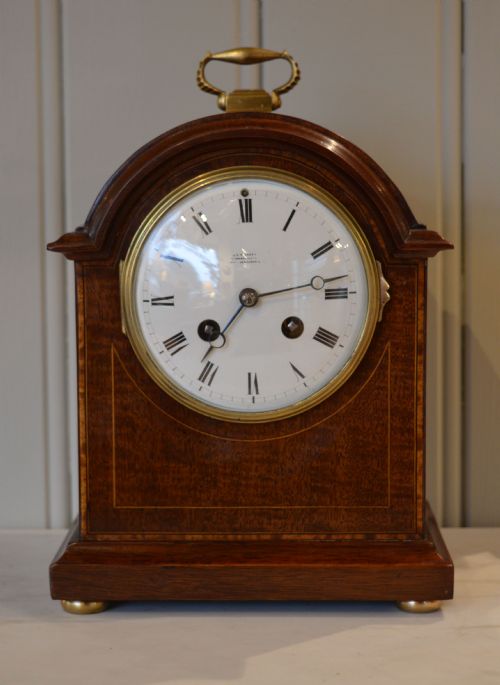 Mahogany and Inlay Striking Mantel Clock