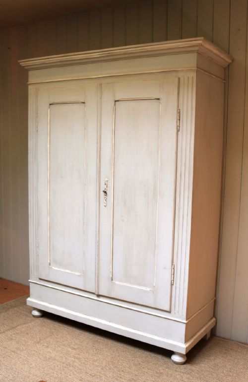 fig 1. Substantial Continental Painted Two Door Wardrobe