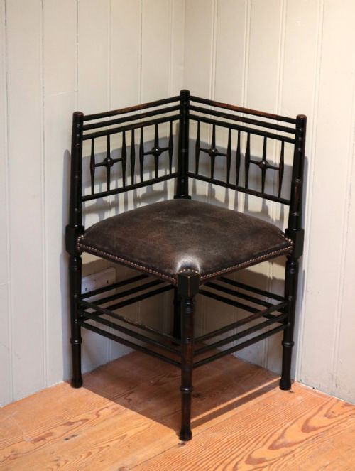 fig 1. Morris & Co Ebonised Corner Chair