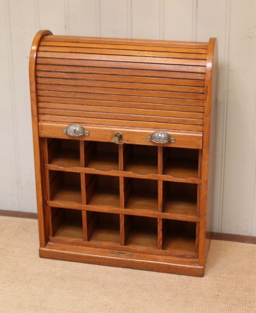 fig 1. Unusual Tambour Front Cabinet