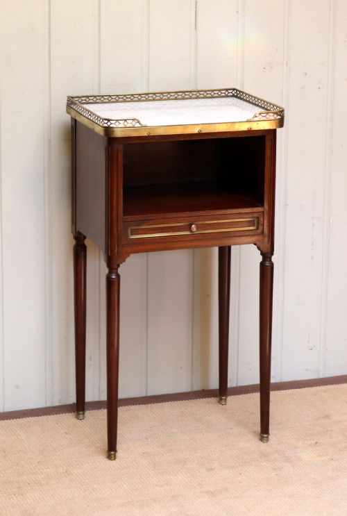 French Mahogany Marble Top Bedside Cabinet Having a Brass Galleried Op Edge with a Single Drawer Below an Open Cupboard Base Raised on Turned Tapering Legs

current Condition
good Original Condition

dimensions
40.00cm Wide   74.00cm High   30.50cm Deep (15.75 Inches Wide  29.13 Inches High  12.01 Inches Deep) 

Please Note
although Most Items Are on Display in Our Shop Some Maybe in Our Off-site Store. If You Are Planning to Visit US to View a Specific Item Please Check with US First.

price: Gbp 240.00 (Pound Sterling)