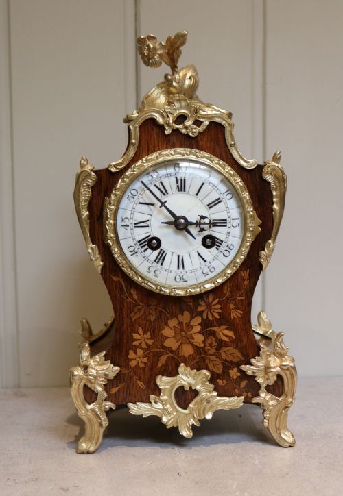 fig 1. Rosewood and Marquetry Bell Striking Mantel Clock (France, 1889)