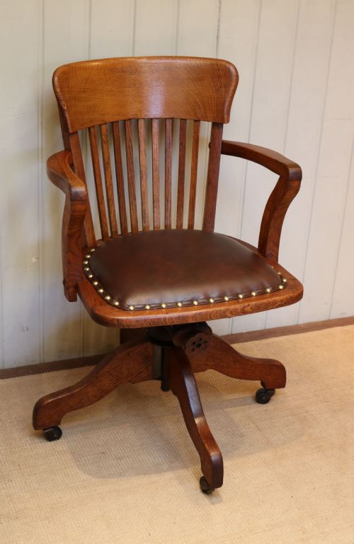 fig 1. Solid Oak Revolving Office Chair