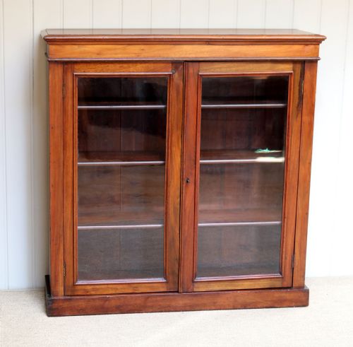 fig 1. Walnut Two Door Glazed Bookcase 