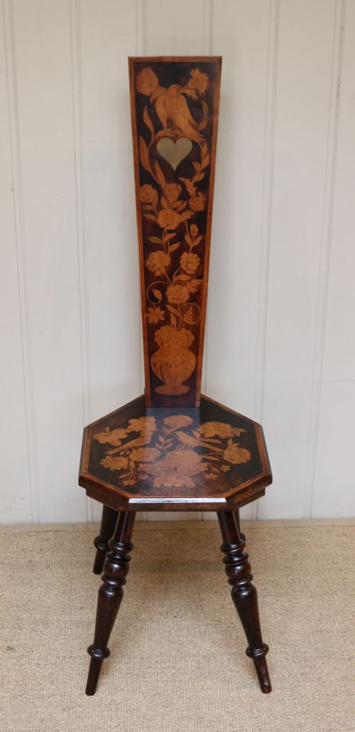 fig 1. Ornate Pokerwork Spinning Chair