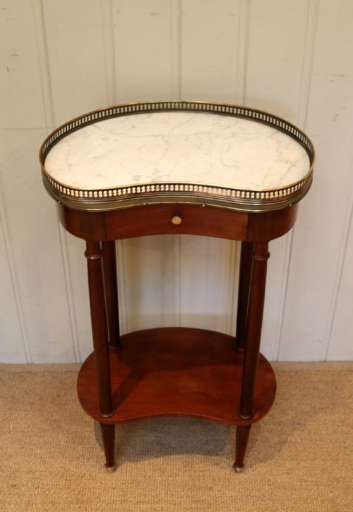 fig 1. Marble Top Kidney Shaped Table