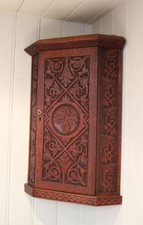 fig 1. Carved Oak Corner Wall Cabinet