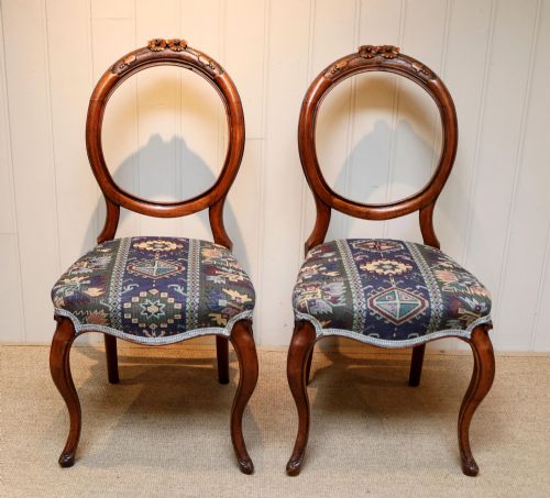 Pair of Walnut Balloon Back Chairs