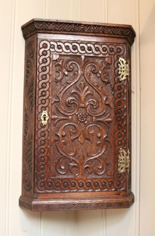 Mid 19th Century Carved Oak Corner Wall Cabinet
