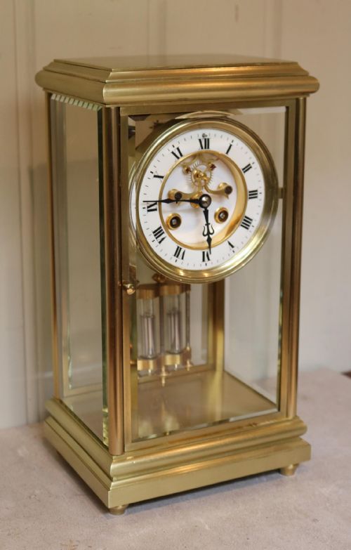 fig 1. Bell Striking Brass Four Glass Clock