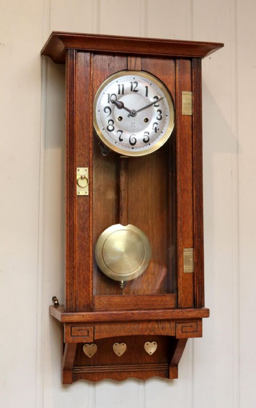 Oak Arts and Crafts Striking Wall Clock