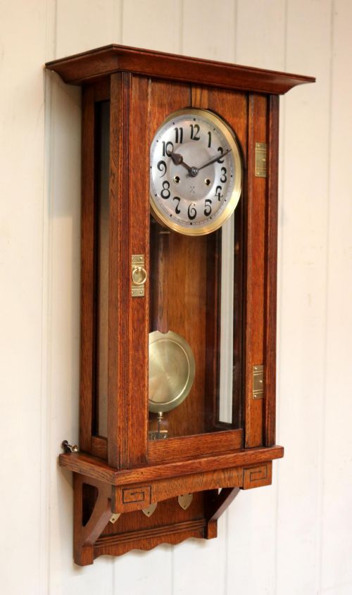 fig 1. Oak Arts And Crafts Striking Wall Clock