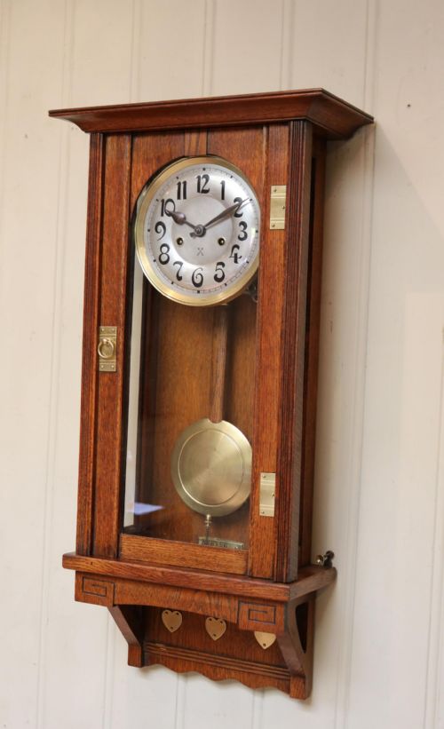 fig 2. Oak Arts And Crafts Striking Wall Clock