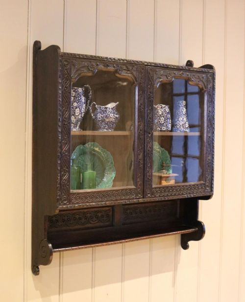 Carved Dark Oak Wall Cabinet