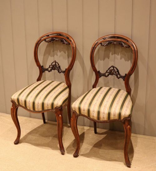 Pair of Victorian Walnut Balloon Back Chairs