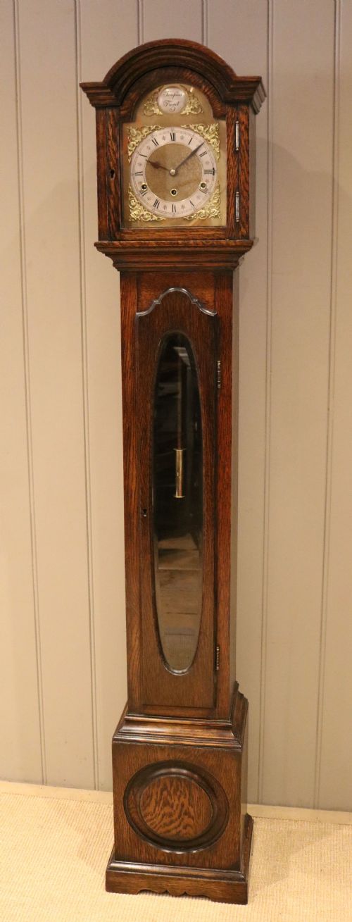 fig 1. Westminster Chime Oak Grandmother Clock
